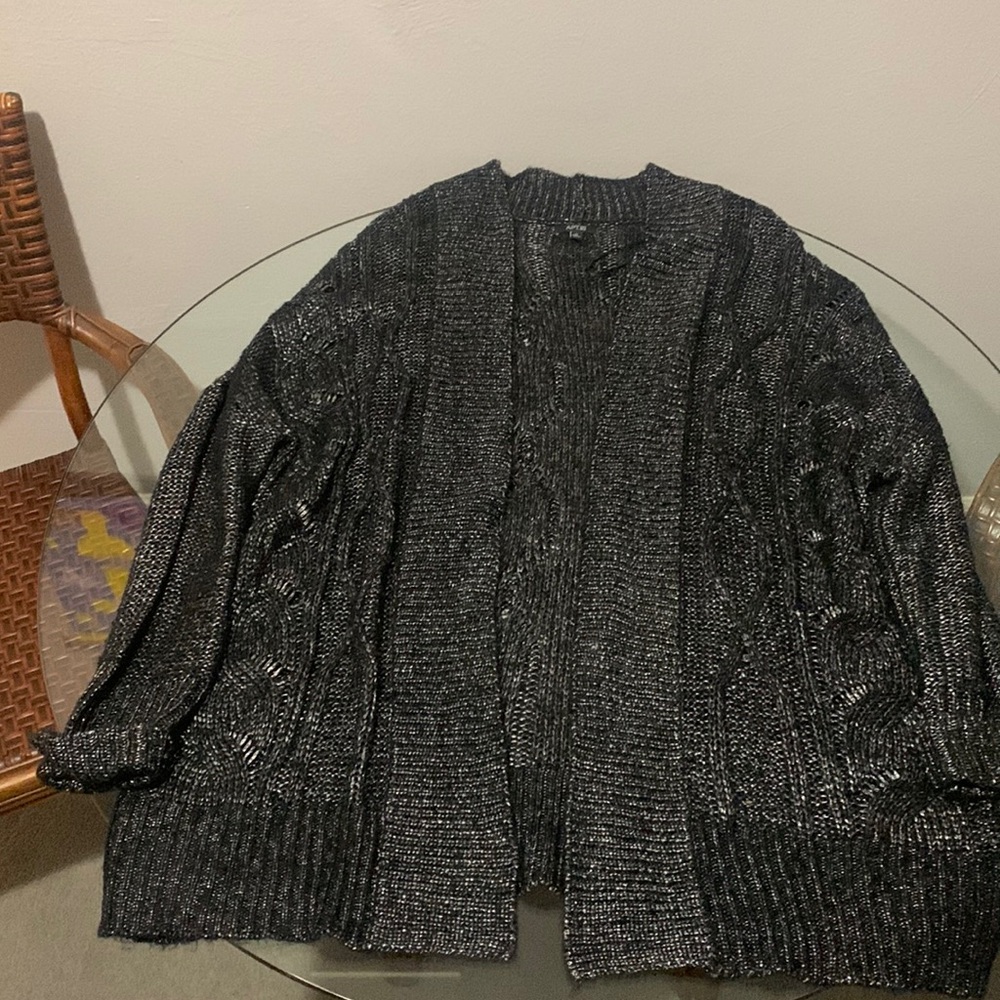 Excellent nicely woven black and silver sweater
